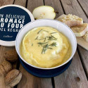 Fromage à fondu dans le cuiseur bleu Cookut