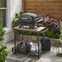 Barbecue gaz Q 2100 N noir Weber sur une terrasse de jardin