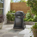 Barbecue gaz Q 2800 N + sur chariot noir Weber sur une terrasse