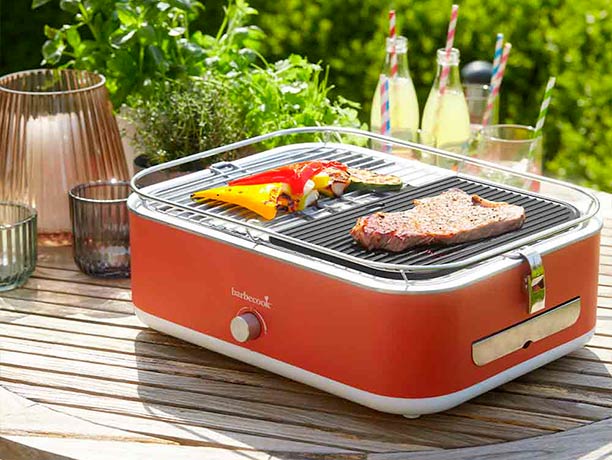 Demi plancha en fonte face rainurée sur barbecue électrique Carlo Barbecook